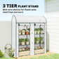 Small 3-tier mini greenhouse with wire shelves holding potted plants, white cover and green frame