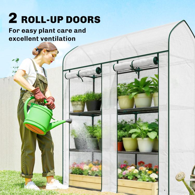 3-tier mini greenhouse with two roll-up doors open, green metal frame and wire shelves