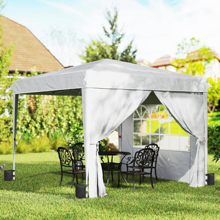 White pop-up canopy tent with sidewalls and front curtain panels