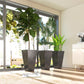 Three black tapered plastic planters with speckled marble finish