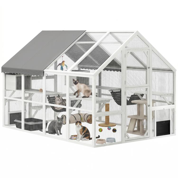 White outdoor wooden cat enclosure with gray roof, platforms and multiple condos