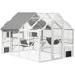 White wooden outdoor cat enclosure with mesh sides, multi-compartment interior, gabled roof