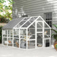 White outdoor wooden cat enclosure with gray roof and enclosed multi-level compartments