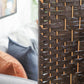Brown woven privacy screen panel with lattice weave and vertical frame