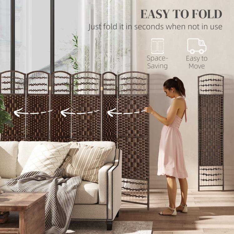 Brown 8-panel folding room divider being unfolded beside sofa and curtains