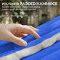 Close-up of blue hammock fabric with padded surface and hand pressing