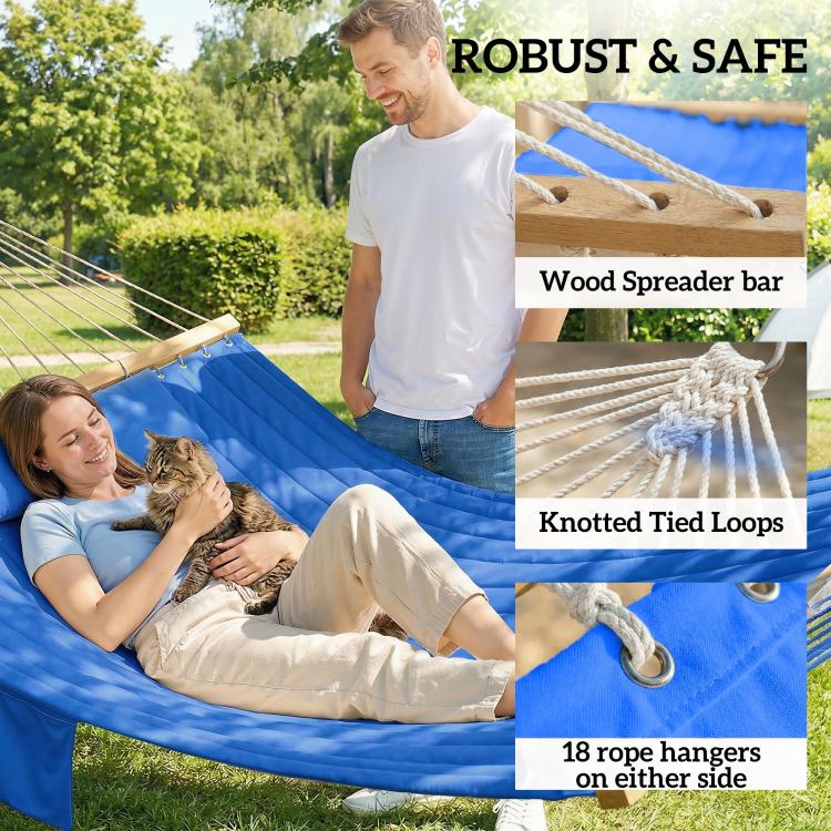 Blue hammock with wooden spreader bar, rope loops, and side hangers; pet lounging