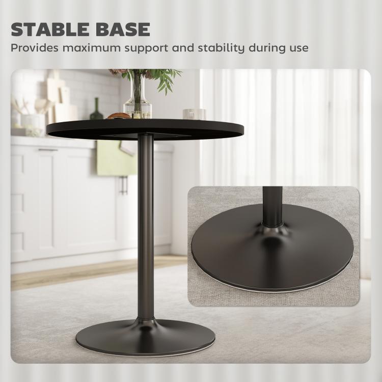 Round black pedestal-base table with wide round foot for stability and wood-grain top