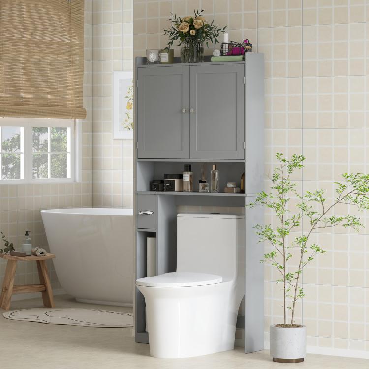 Gray over-the-toilet storage cabinet with two doors and open shelves beside toilet