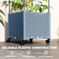 Gray-blue woven raised planter side with trellis posts and caster wheels