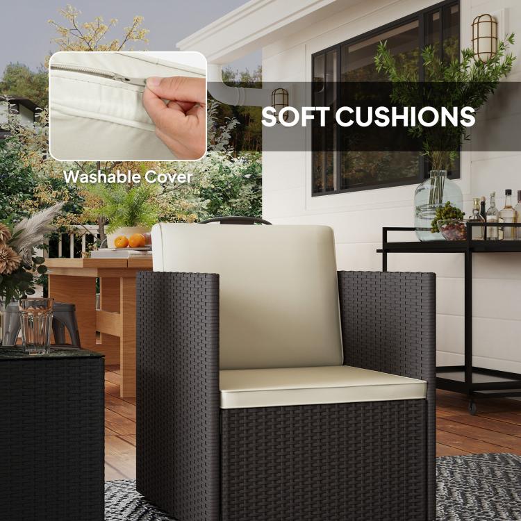 Dark wicker armchair with cream cushion and upholstered back