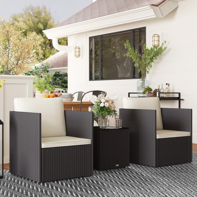 Wicker bistro set with two armchairs and square coffee table, cream seat cushions