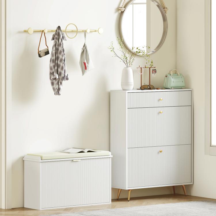 White shoe storage bench with padded seat cushion and closed flip drawer, entryway use