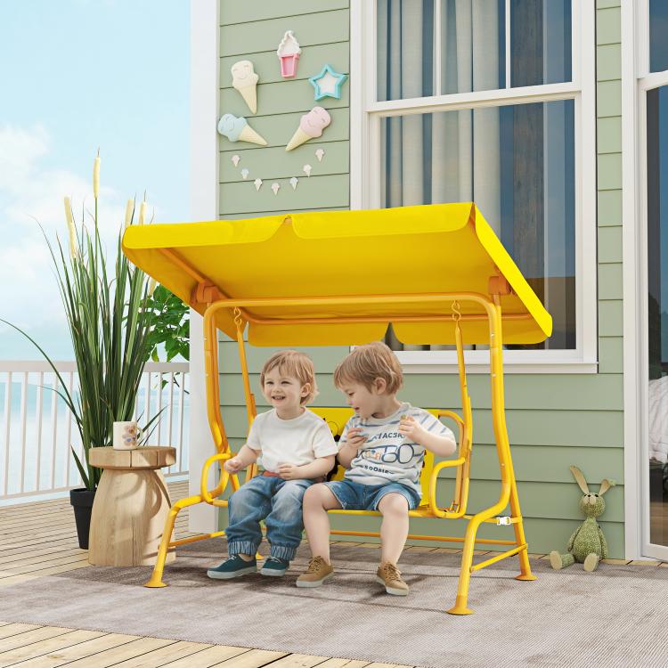 Yellow kids swing chair with adjustable canopy and cartoon bear seat panel