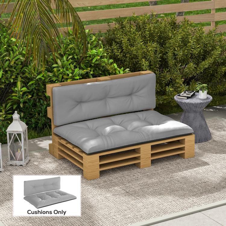 Light gray tufted outdoor pallet cushion set on wooden pallet-style bench