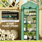 Green 4-tier mini plant greenhouse with wire shelves and transparent PE front