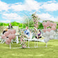 White metal backdrop arch frame set with pink and white balloons and flower arrangement