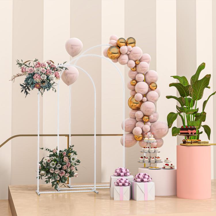 White metal backdrop arch frame set with flower decor and balloon letter-style panels