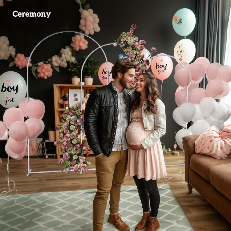 White metal backdrop arch frame with floral decor and pastel balloon clusters