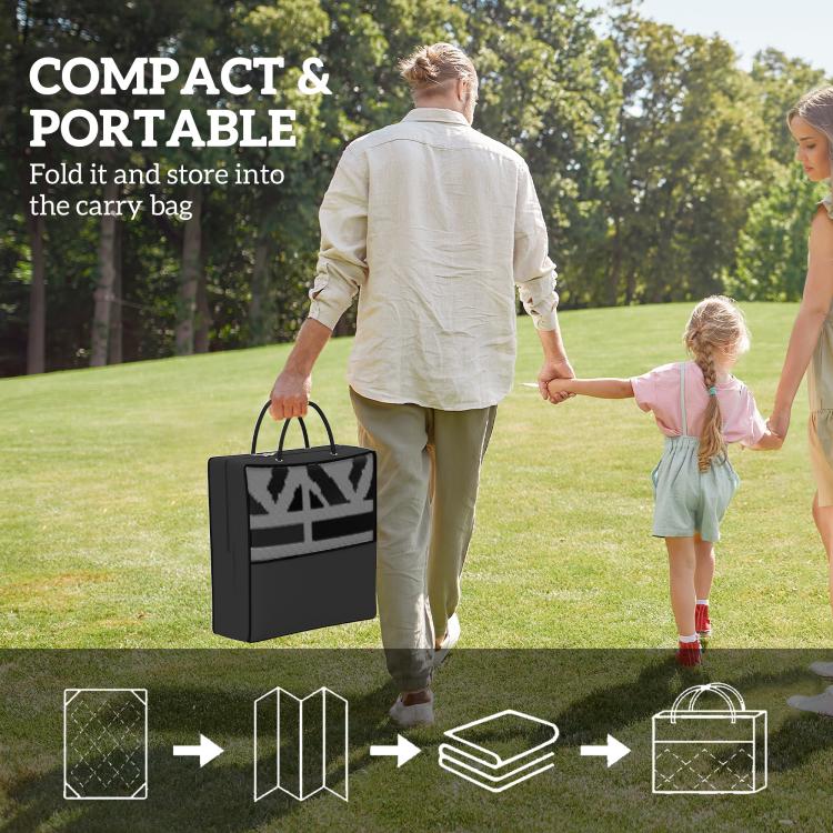 Compact portable rug carrying bag with black geometric rug pattern, folded for storage