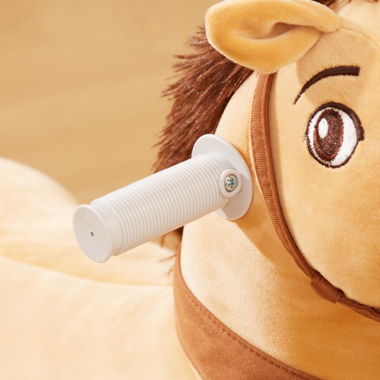 Brown plush pony ride-on with white handle and detailed face