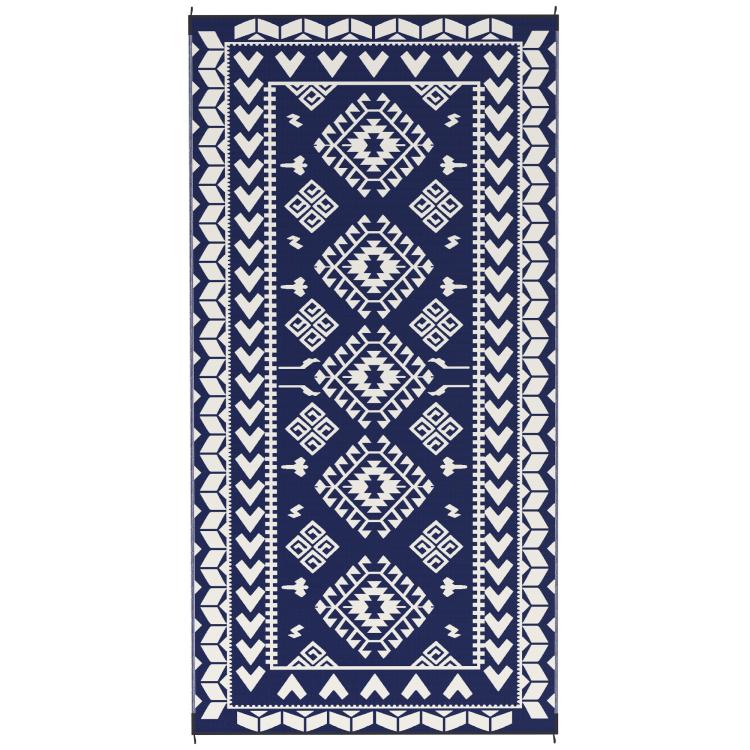 Blue and white reversible rug with border and diamond tile geometric pattern
