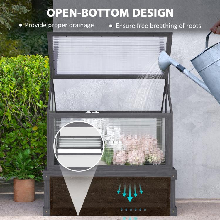 Gray raised greenhouse cold frame with open-bottom design and clear glazing