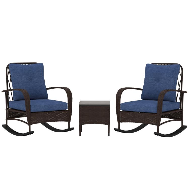 Two brown wicker rocking chairs with blue seat cushions and side coffee table