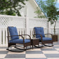 Brown PE rattan rocking chairs with blue cushions on an outdoor patio
