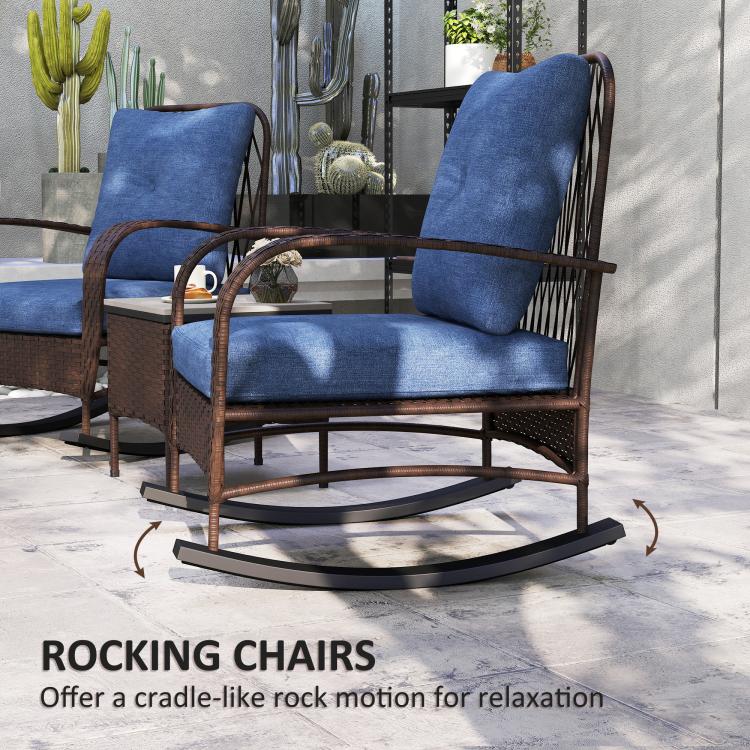 Brown PE rattan rocking chair with blue cushions, angled view of curved arms