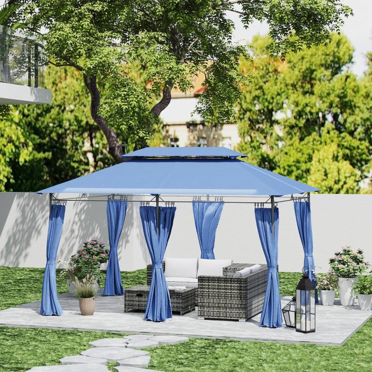 Outdoor patio gazebo with blue curtains, double roof, and cushioned seating set