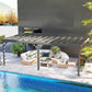 Gray wooden pergola over outdoor lounge area with open roof and four support posts