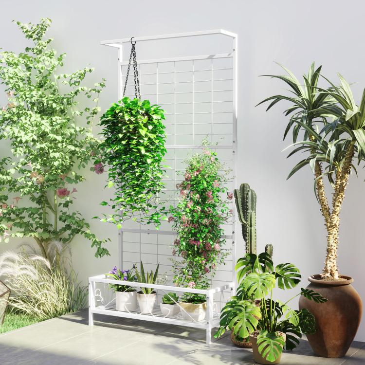 White trellis plant stand with hanging chain and bottom shelf holding multiple pots