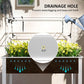 White raised garden bed with clear cover showing drainage hole for watering