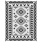 Outdoor rug flat lay showing black and white tribal geometric pattern