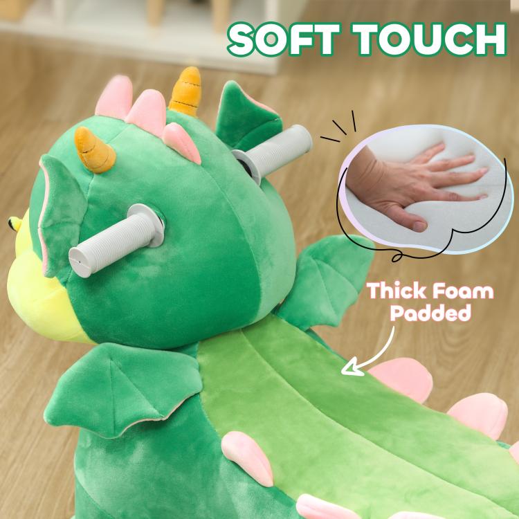 Green plush ride-on dinosaur toy with thick padded body and white side handles