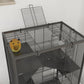 Top view of 4-tier hamster cage with dark wire panels, ramps, wheel, and glass base