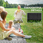 Black-and-white geometric outdoor rug with kids sitting on it