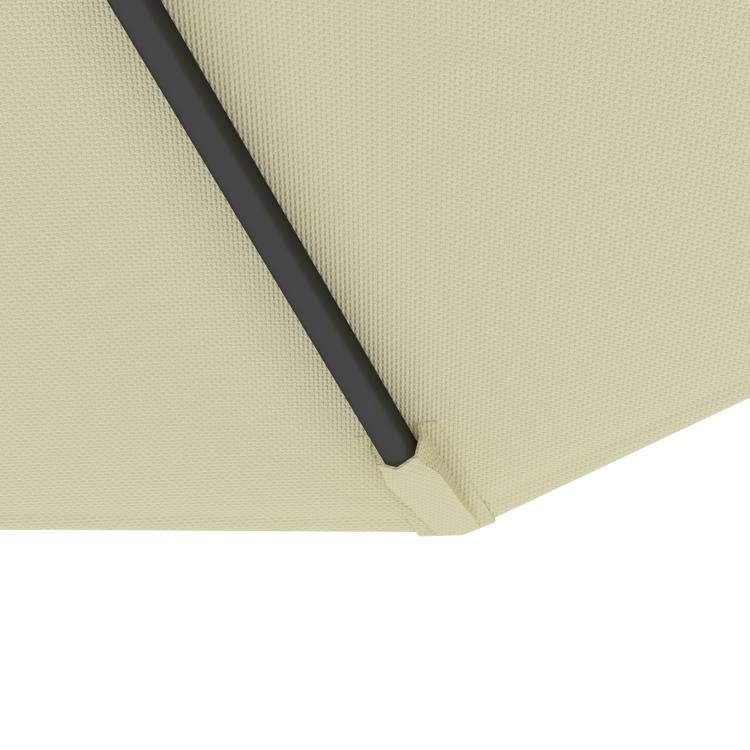 Beige umbrella canopy fabric close-up with black support pole and stitched edge.