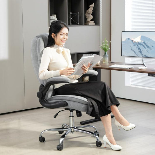 Gray office chair with quilted back, flip-up armrests, and chrome five-wheel base
