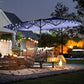 Navy patio umbrella with LED light strings across the canopy for outdoor lounge