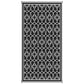 Outdoor rug with border, black and white quatrefoil trellis lattice pattern