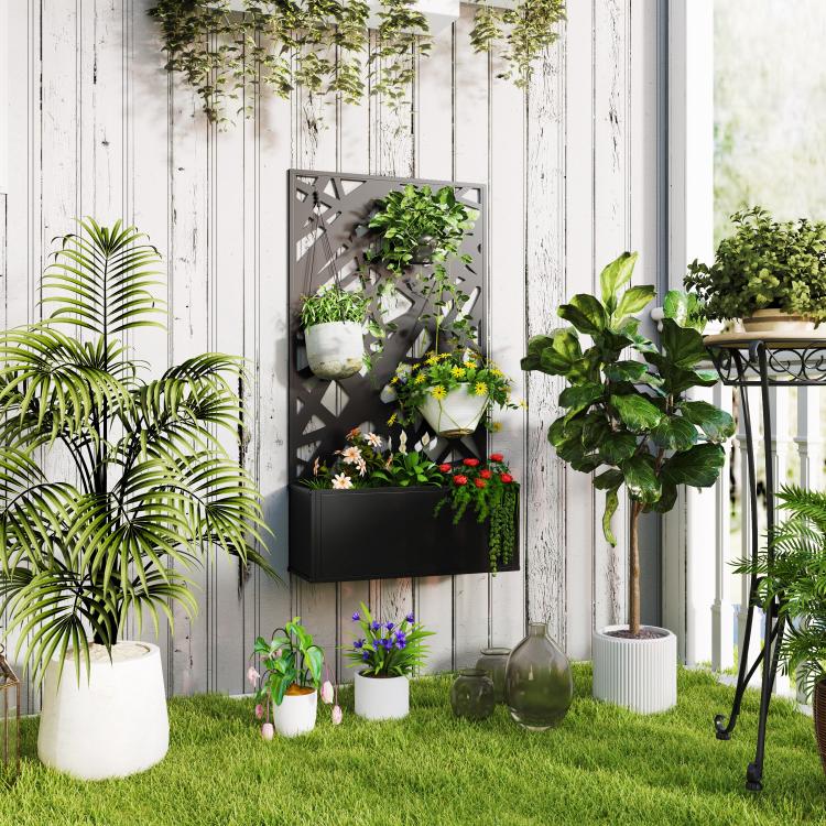 Black wall-mounted metal planter box with decorative privacy screen and green plants