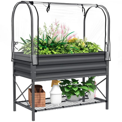 Dark gray metal raised garden bed with clear cover and built-in bottom shelf