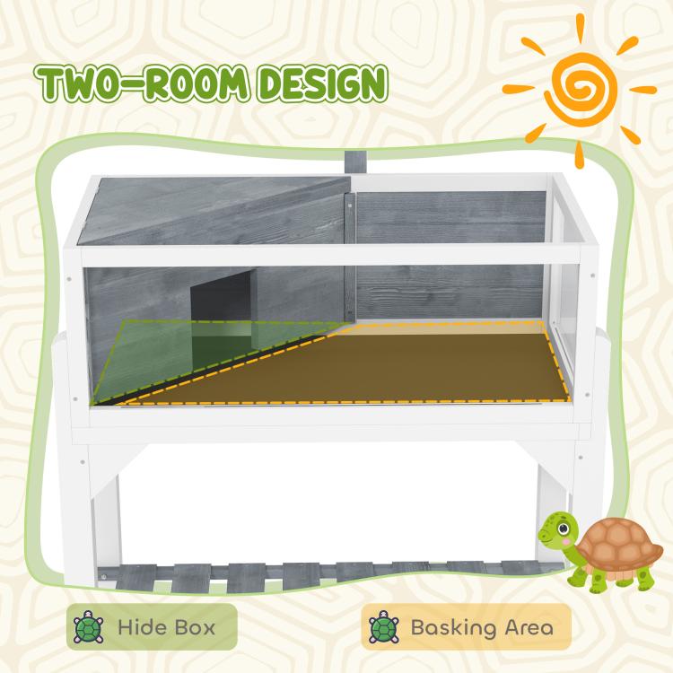 Gray wooden tortoise enclosure with two internal areas and clear window panels