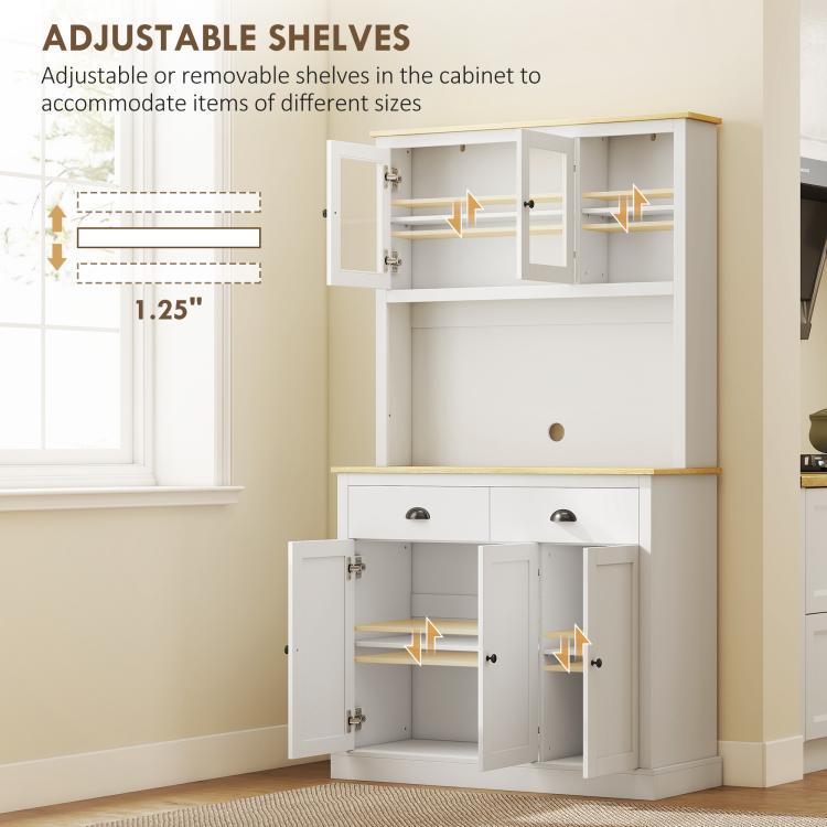 White cabinet interior with adjustable shelves and open compartments behind lower doors