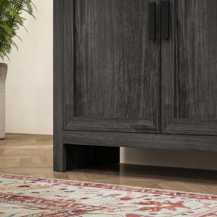 Gray oak kitchen pantry cabinet with 4 doors and lower base panel