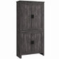 Freestanding gray oak pantry cabinet with 4 doors and square legs