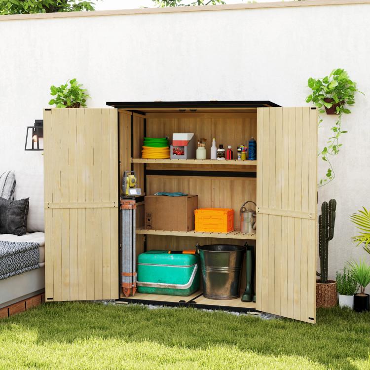 Natural wood storage shed with double doors closed, black roof, and visible shelving inside