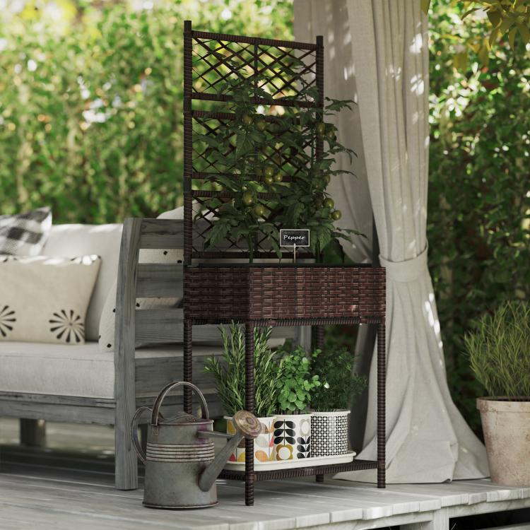 Brown wicker planter stand with climbing trellis and lower shelf with potted plants